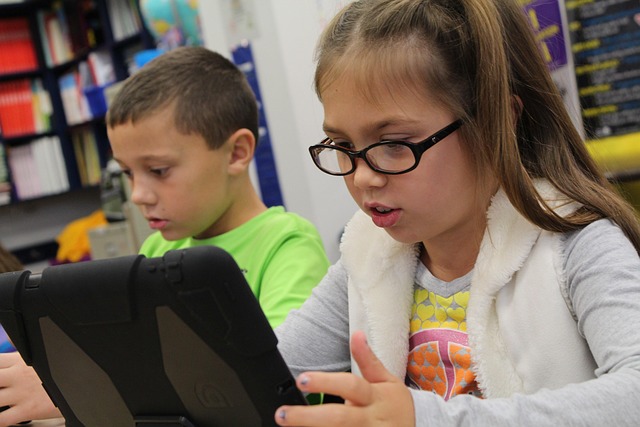 A child learning on a tablet
